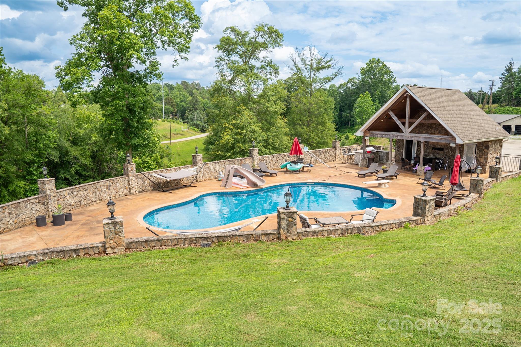 2650 Rainbow Lake Road Inman, SC 29349 - Photo 5 of 48 a swimming pool with outdoor seating and yard
