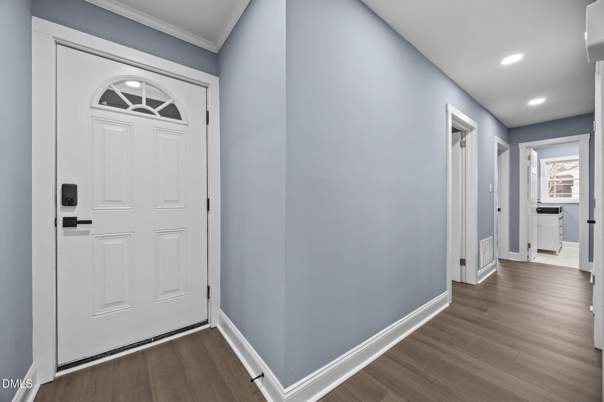 3000 Brentwood Road Raleigh, NC 27604 - Photo 14 of 41 a view of a hallway with wooden floor