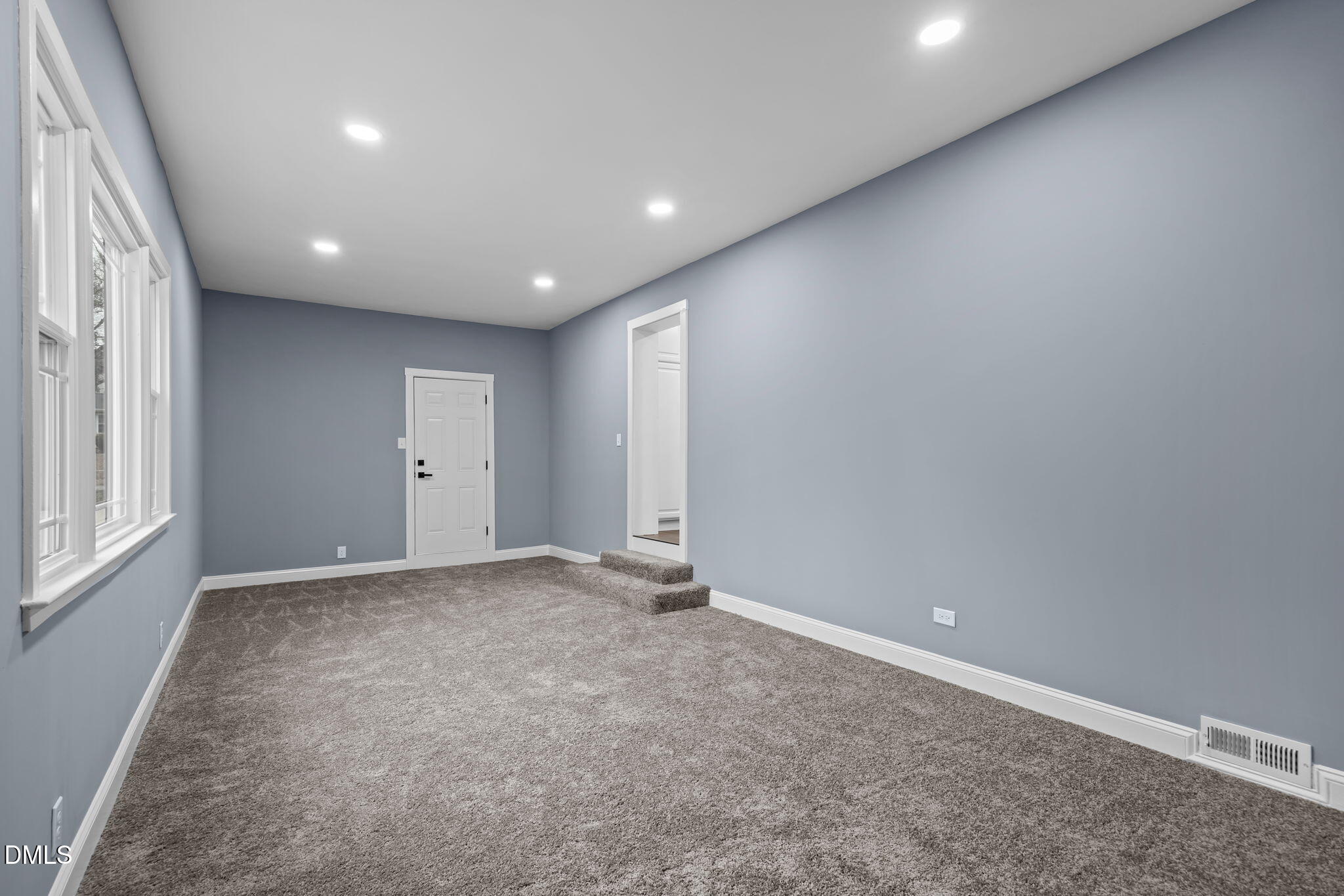 3000 Brentwood Road Raleigh, NC 27604 - Photo 23 of 44 an empty room with windows and closet