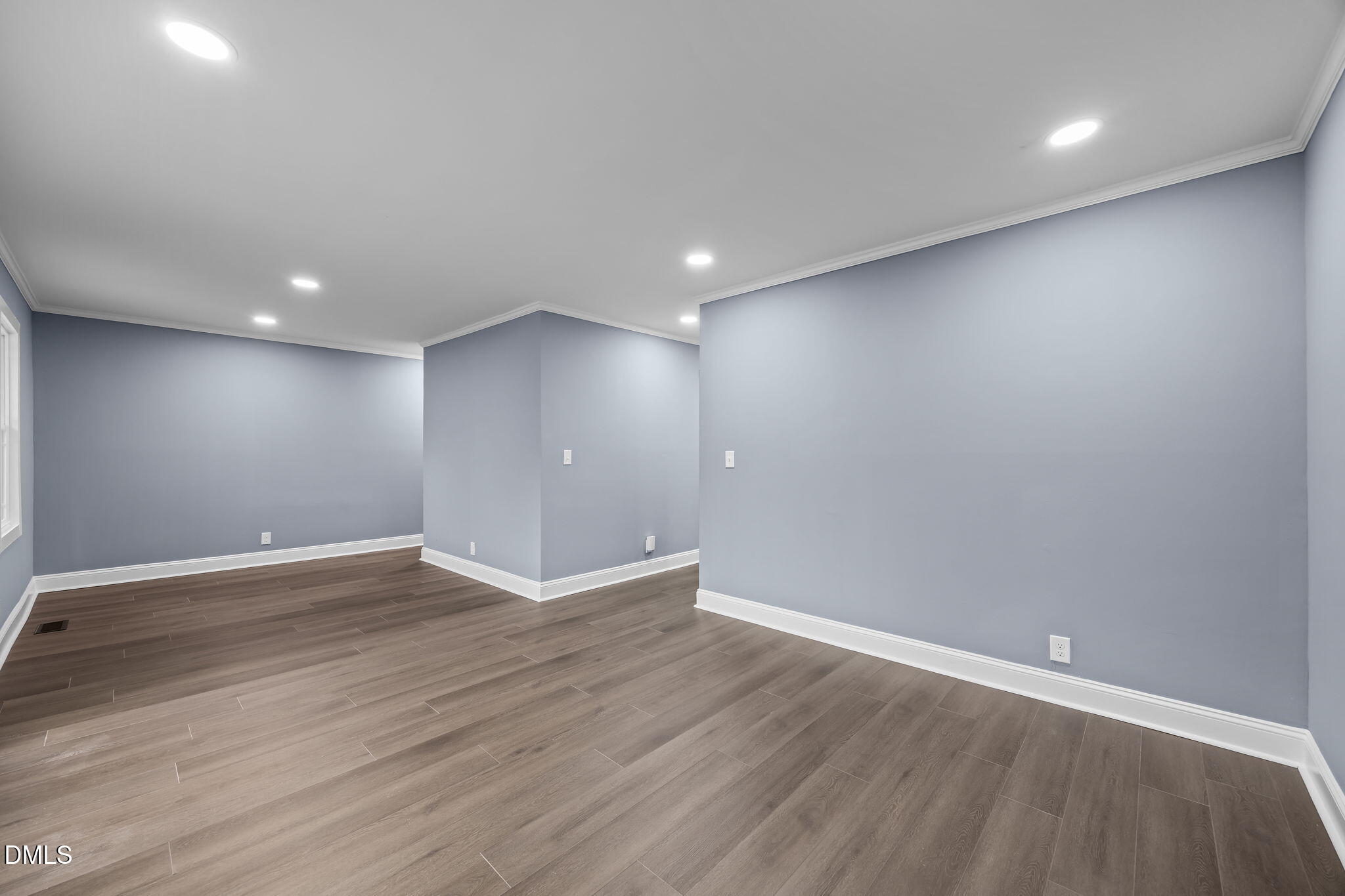 3000 Brentwood Road Raleigh, NC 27604 - Photo 27 of 44 a view of an empty room with wooden floor