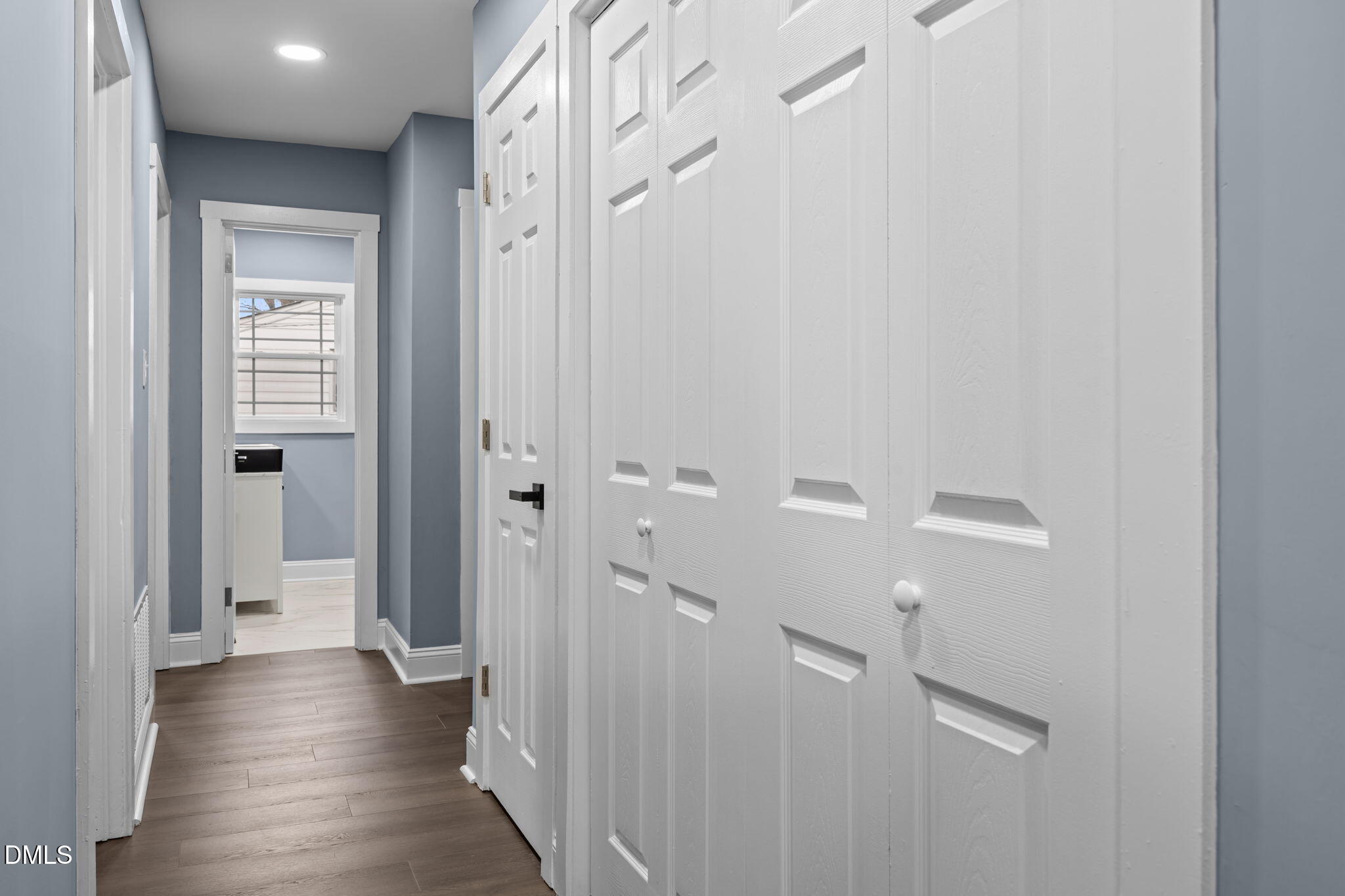 3000 Brentwood Road Raleigh, NC 27604 - Photo 30 of 44 a view of a hallway with wooden floor