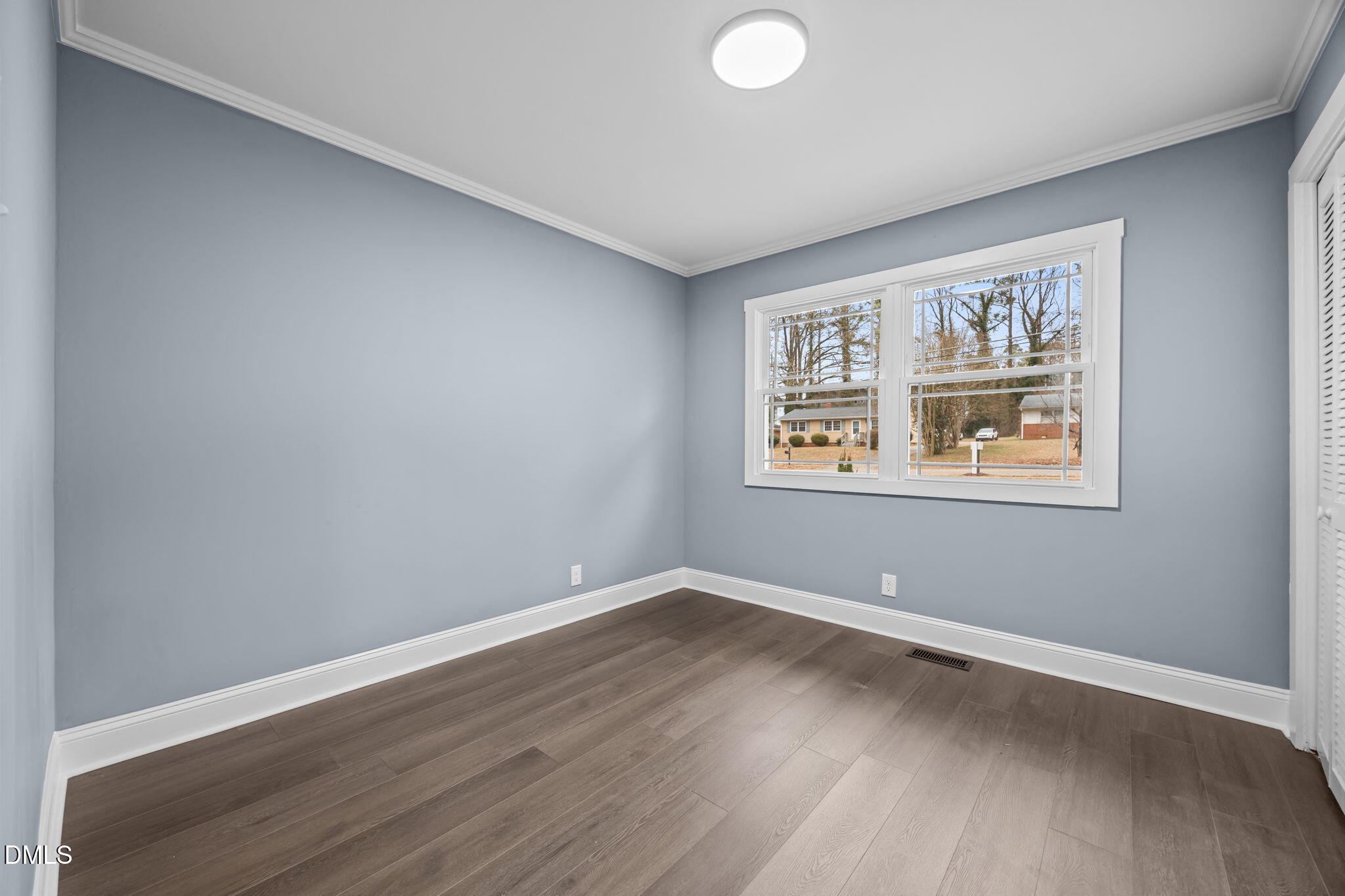 3000 Brentwood Road Raleigh, NC 27604 - Photo 31 of 44 a view of room with hardwood floor and window