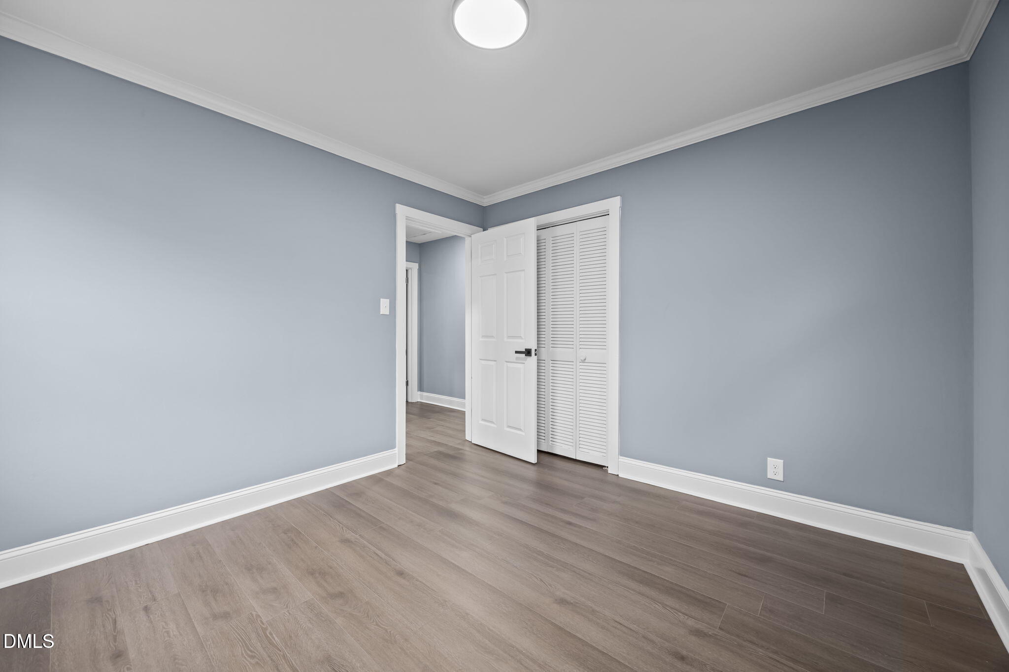 3000 Brentwood Road Raleigh, NC 27604 - Photo 32 of 41 a view of an empty room with wooden floor