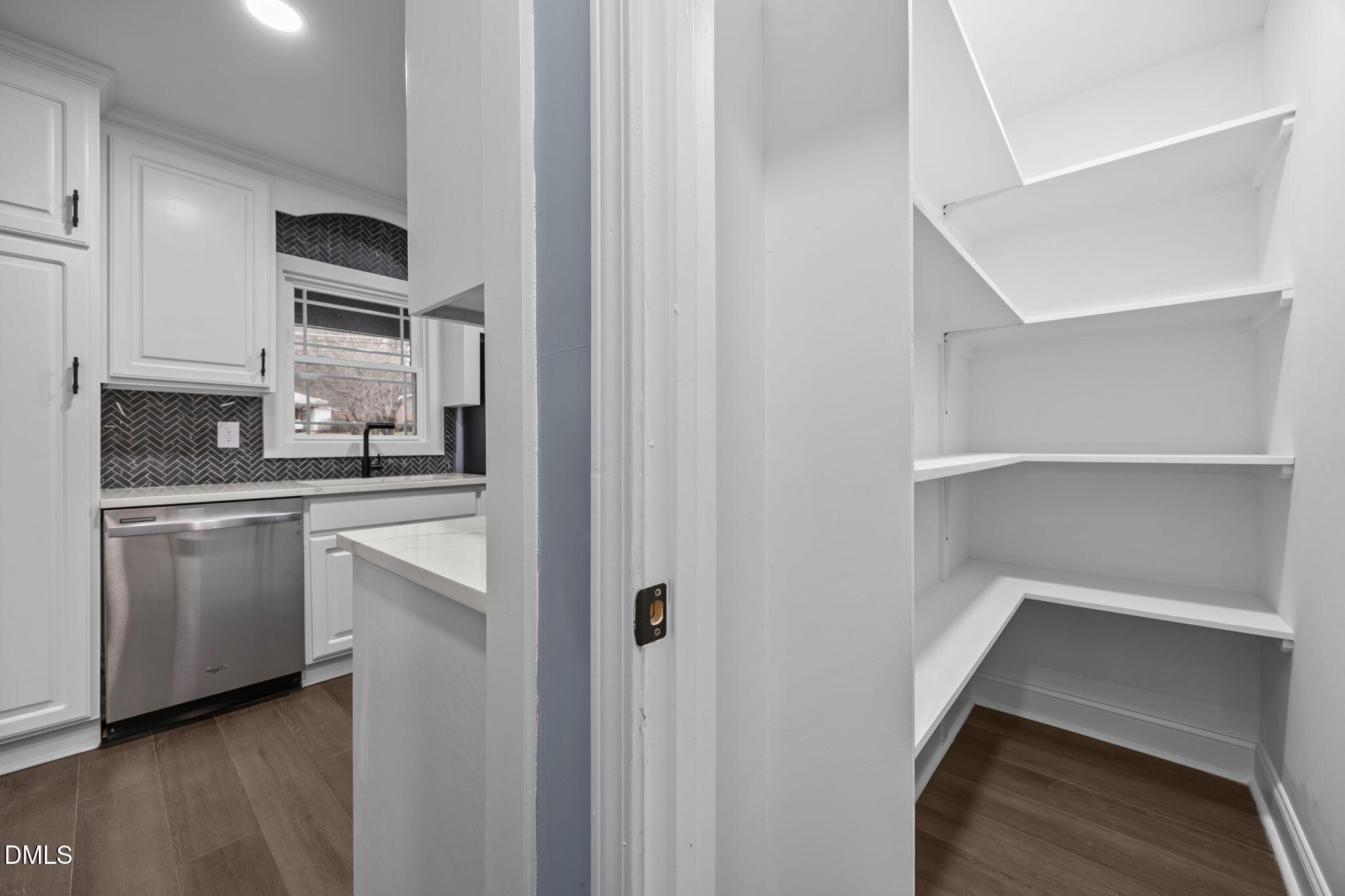 3000 Brentwood Road Raleigh, NC 27604 - Photo 41 of 44 a kitchen with a refrigerator and a stove