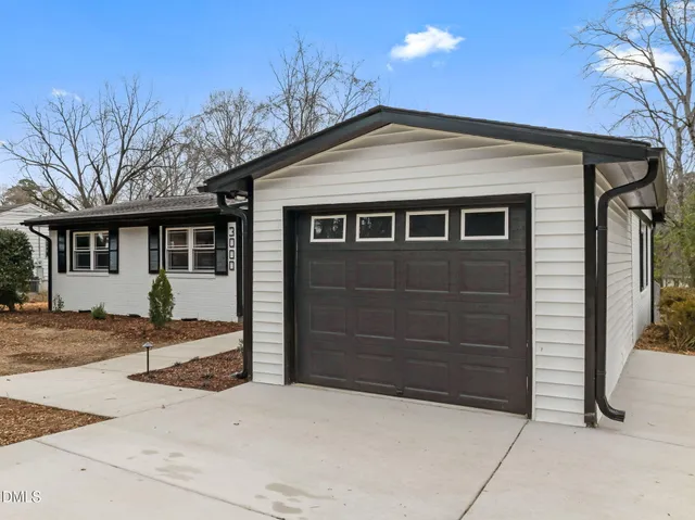a front view of a house with a outdoor space