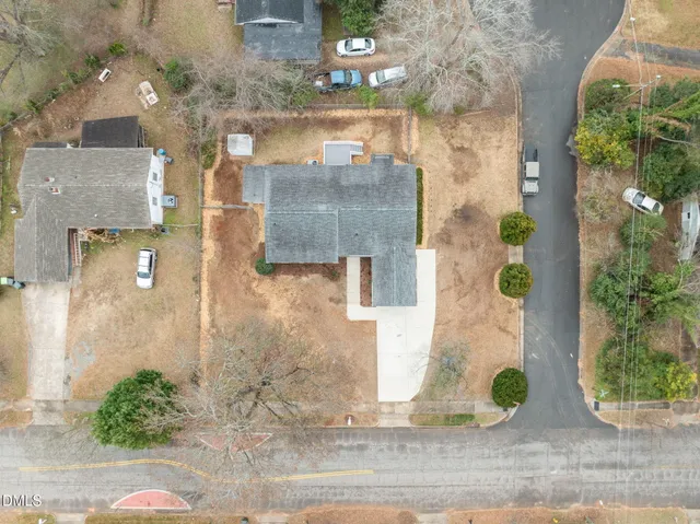 an aerial view of a city with lots of residential buildings