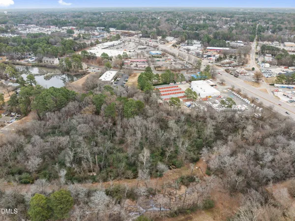 an aerial view of residential building with parking space