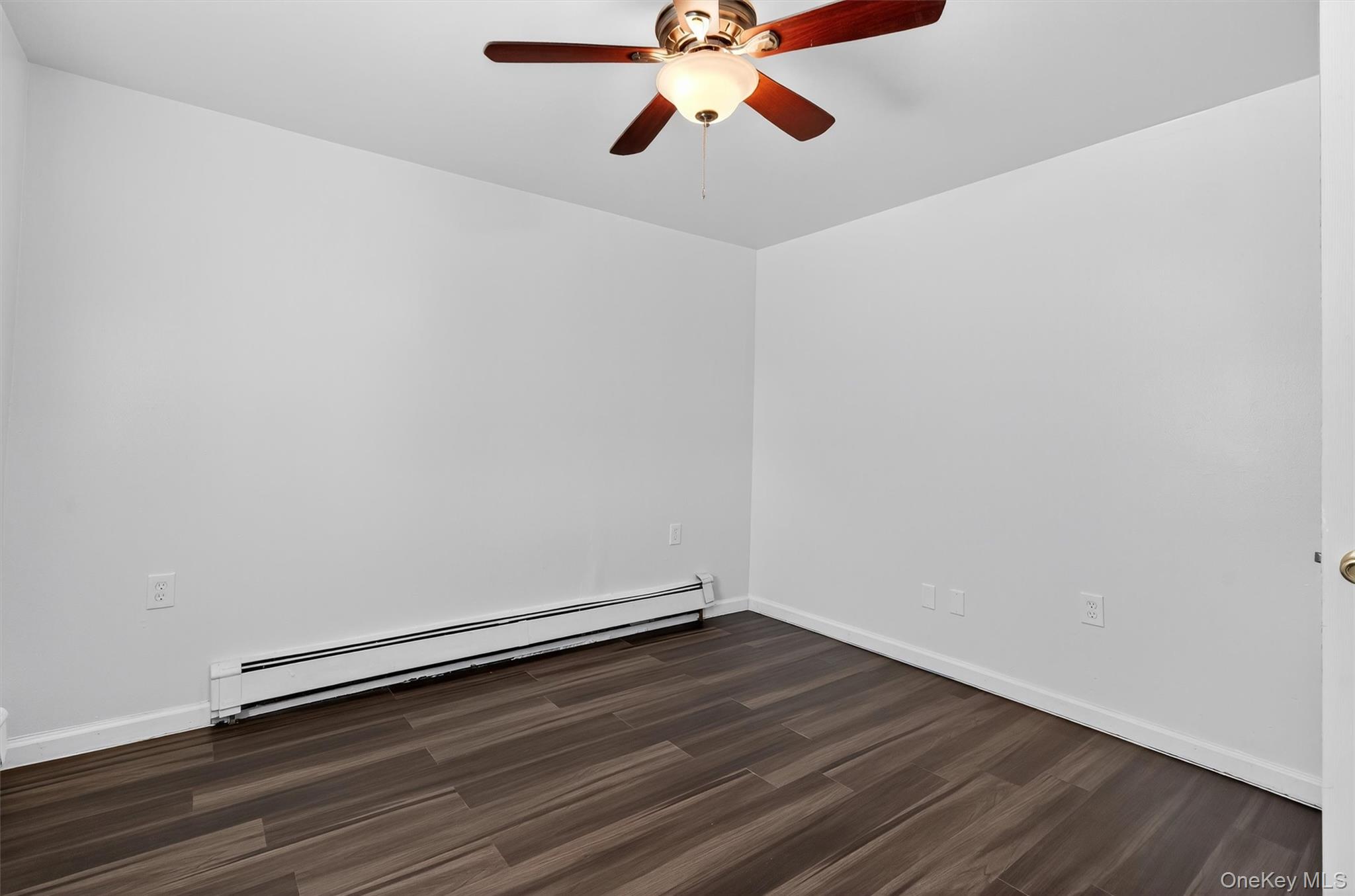 376 Bridgeville Road, Unit 1 Monticello, NY 12701 - Photo 5 of 17 Bright bedroom with newer floors and ceiling fan