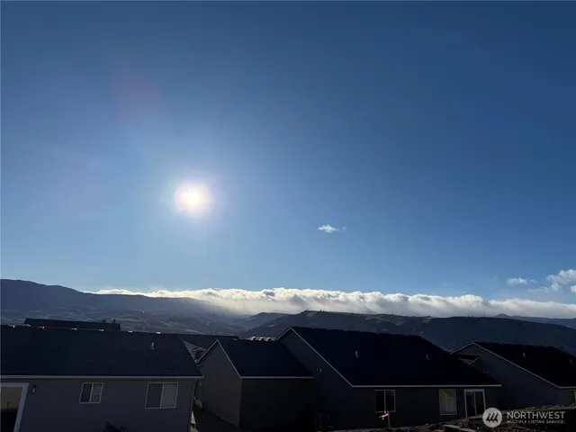 a view of dinning table and chairs