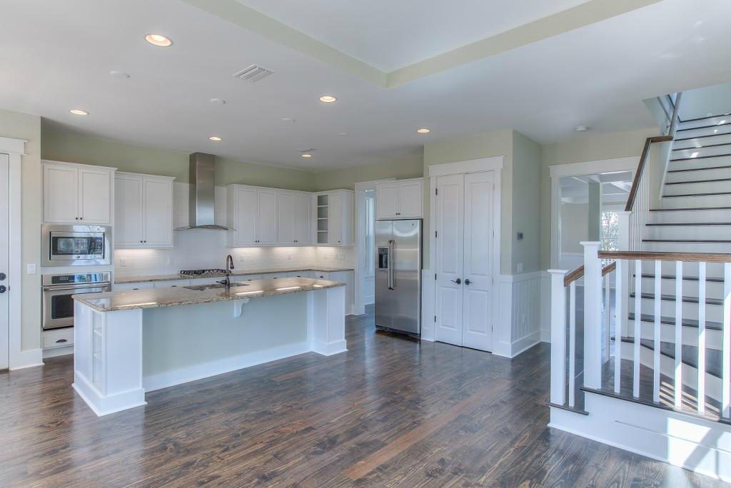 43 Flatwoods Forest Loop Santa Rosa Beach, FL 32459 - Photo 4 of 25 a kitchen with stainless steel appliances a refrigerator and a stove top oven