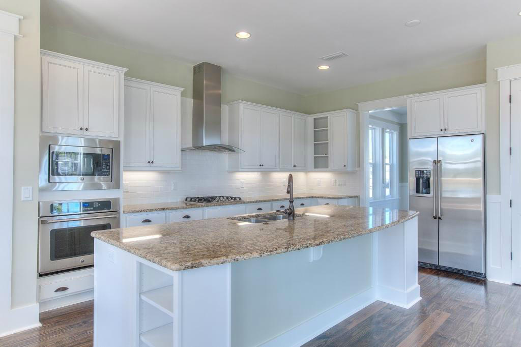 43 Flatwoods Forest Loop Santa Rosa Beach, FL 32459 - Photo 5 of 25 a kitchen with stainless steel appliances granite countertop a sink stove and refrigerator