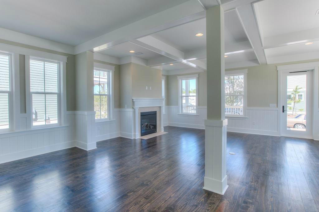 43 Flatwoods Forest Loop Santa Rosa Beach, FL 32459 - Photo 6 of 25 an empty room with wooden floor and windows
