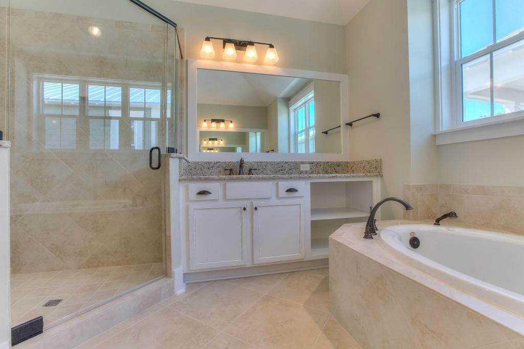 43 Flatwoods Forest Loop Santa Rosa Beach, FL 32459 - Photo 8 of 25 a bath room with a sink and a mirror