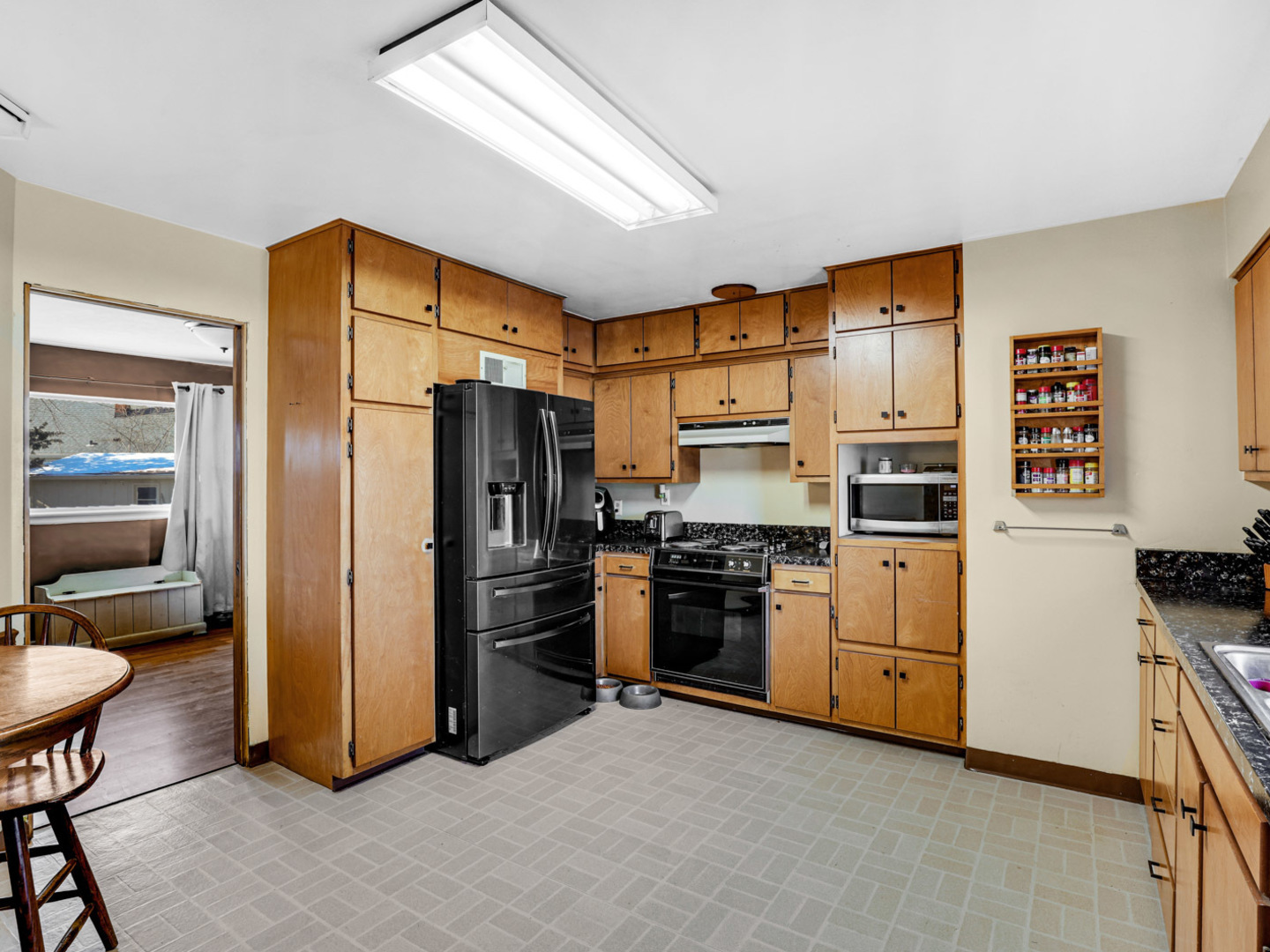 1600 Black Road Joliet, IL 60435 - Photo 8 of 22 a kitchen with stainless steel appliances a refrigerator a stove a sink and dishwasher