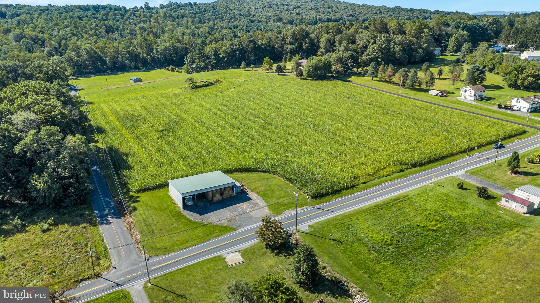 Expansive green fields meet serene landscapes.