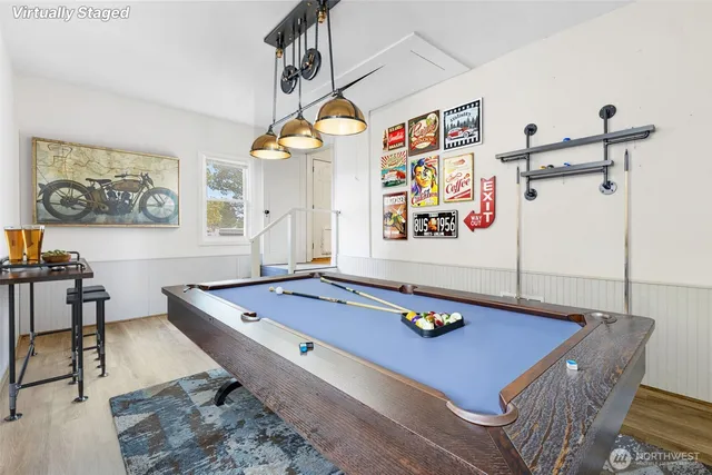 a dining room with a table and chairs