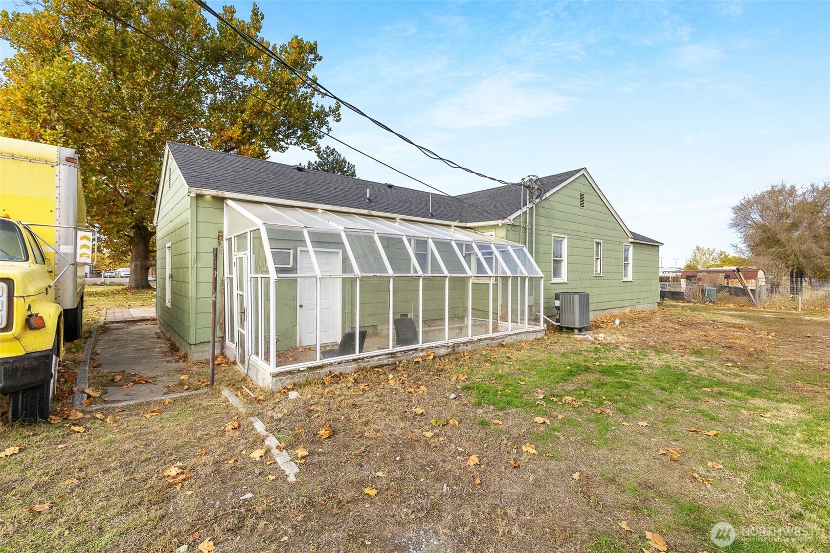 32105 South Finley Road Kennewick, WA 99337 - Photo 29 of 34 a view of a house with a yard