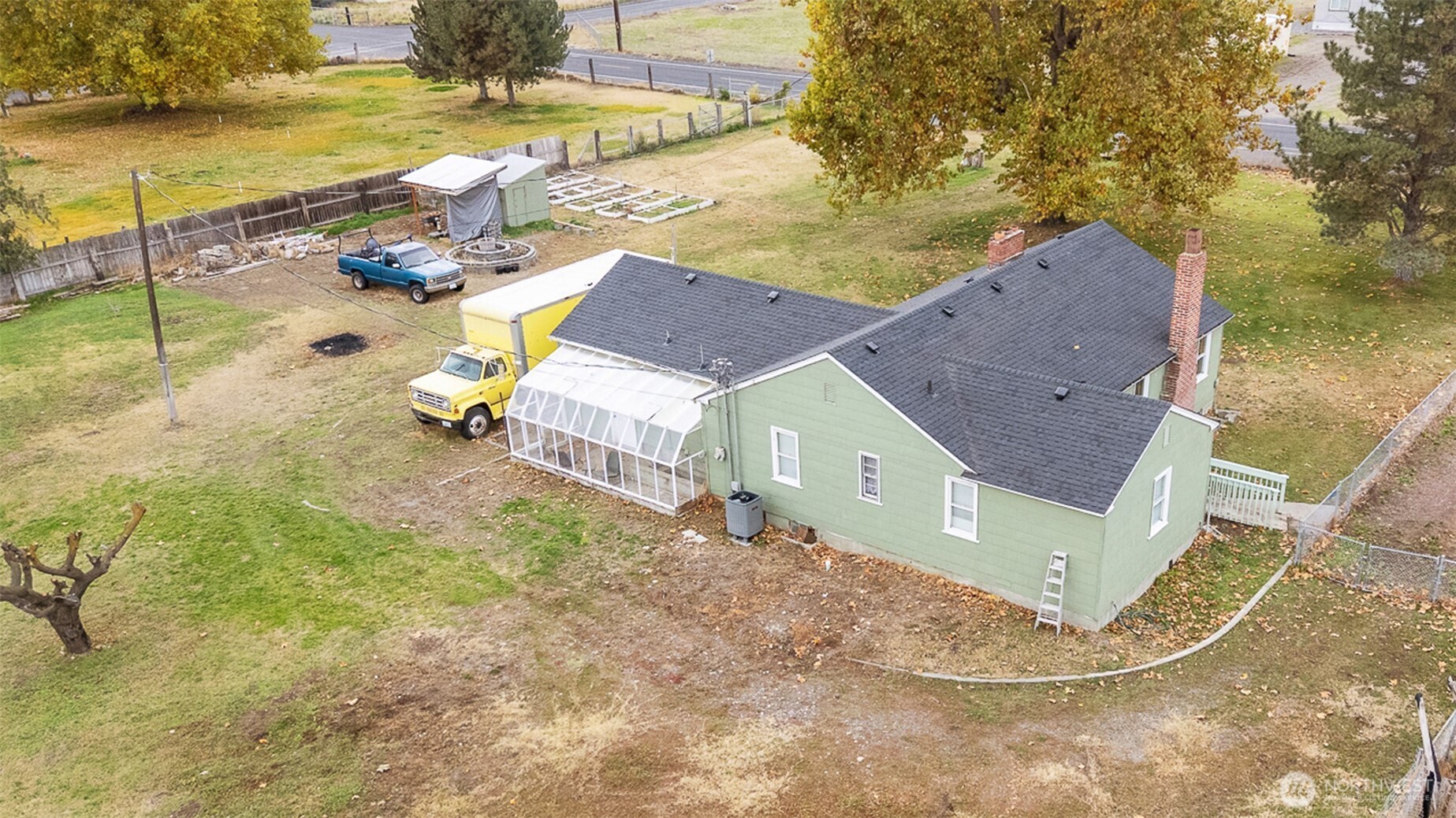32105 South Finley Road Kennewick, WA 99337 - Photo 33 of 34 a view of a house with a yard