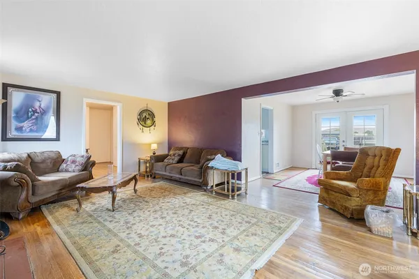 a living room with furniture or couch and a table