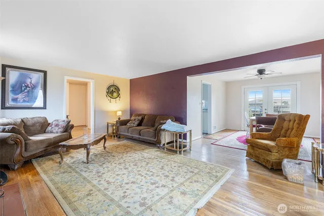 a living room with furniture or couch and a table