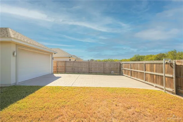 a view of a swimming pool and an outdoor space