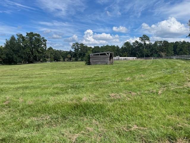 Tbd Southeast 80th Street Ocala, FL 34480 - Photo 2 of 8 a view of a golf course with a lake