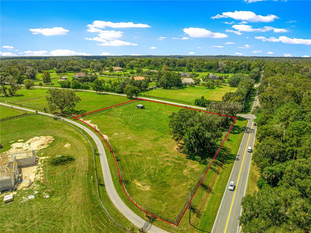 Tbd Southeast 80th Street Ocala, FL 34480 - Photo 7 of 8 a view of a swimming pool with a yard