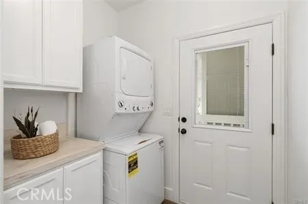 a bedroom with a bed and cabinets