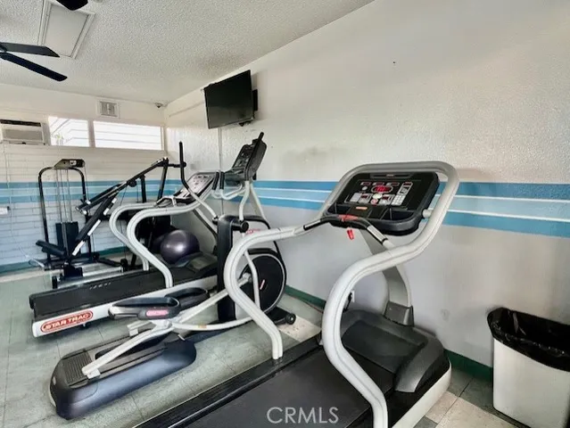 a view of a room with gym equipment