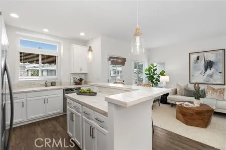 a kitchen with a sink and stove