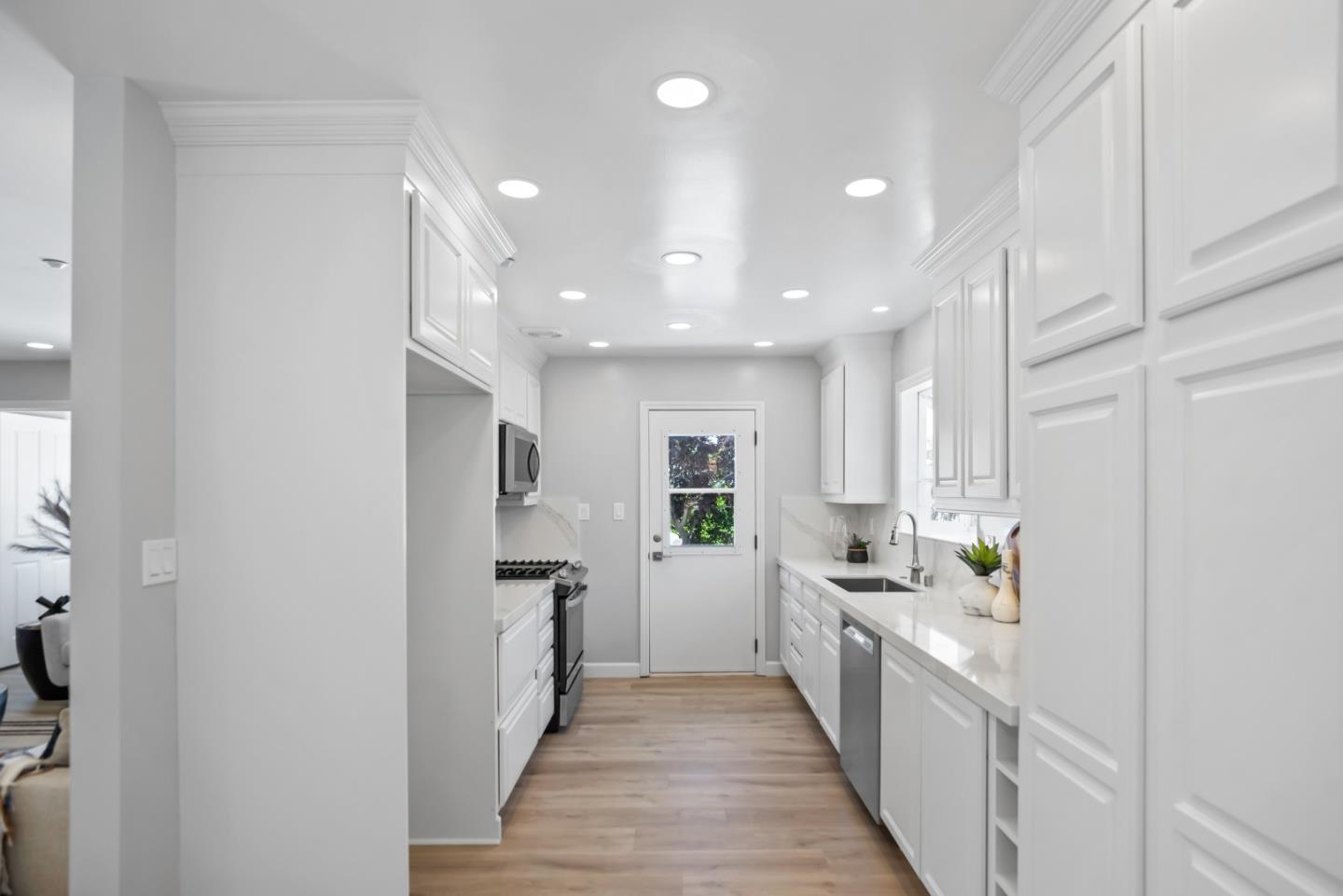 967 Chelan Drive Sunnyvale, CA 94087 - Photo 12 of 38 a kitchen with stainless steel appliances a refrigerator and a sink