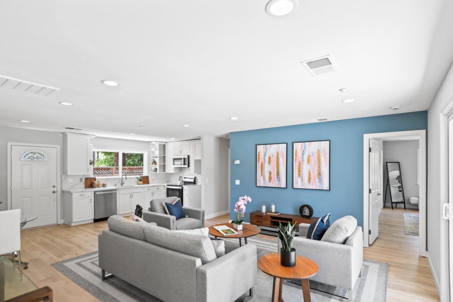 967 Chelan Drive Sunnyvale, CA 94087 - Photo 20 of 38 a living room with furniture and a fireplace