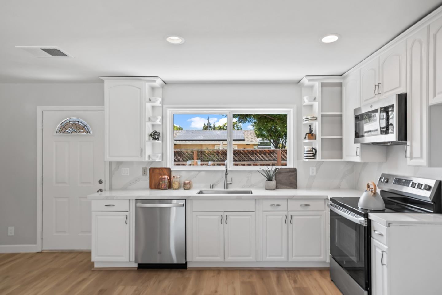 967 Chelan Drive Sunnyvale, CA 94087 - Photo 23 of 38 a kitchen with cabinets and window