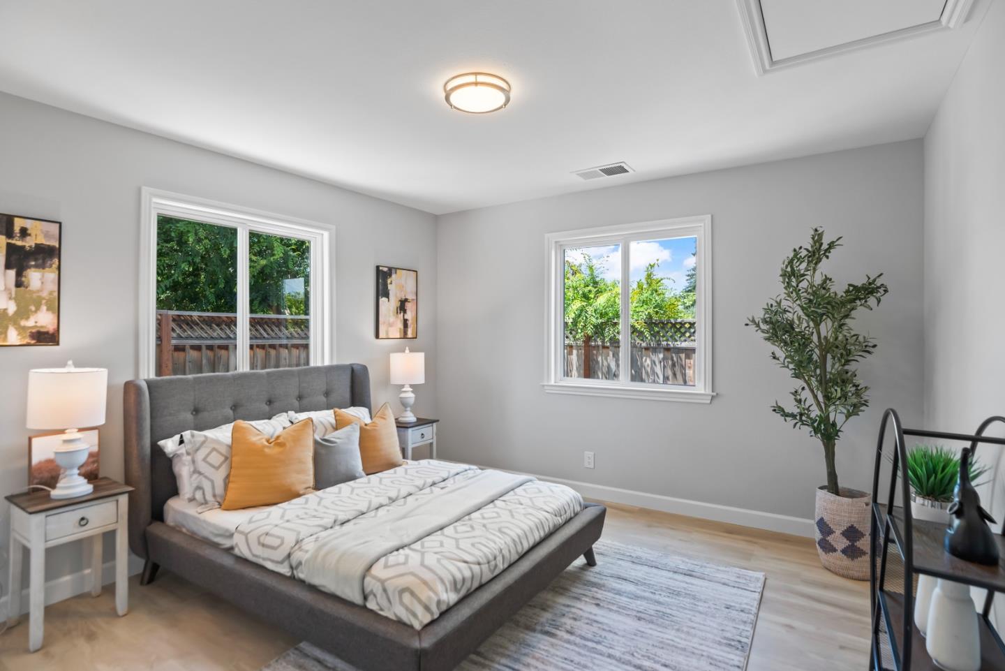 967 Chelan Drive Sunnyvale, CA 94087 - Photo 25 of 38 a bedroom with a bed and a window