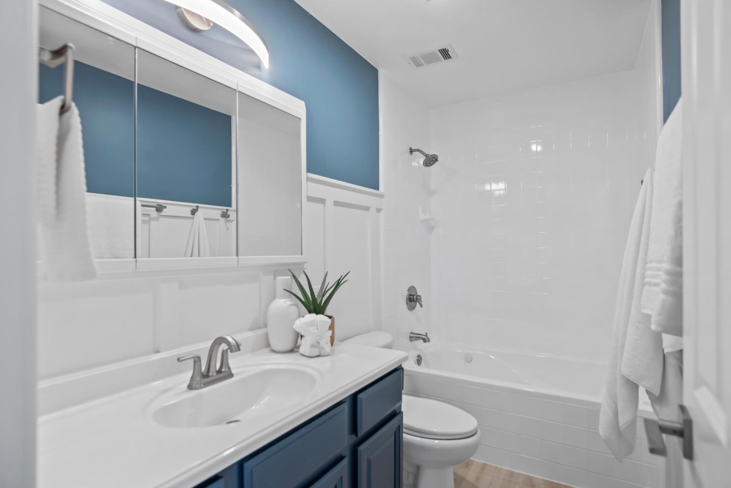 967 Chelan Drive Sunnyvale, CA 94087 - Photo 26 of 38 a bathroom with a sink a toilet and shower