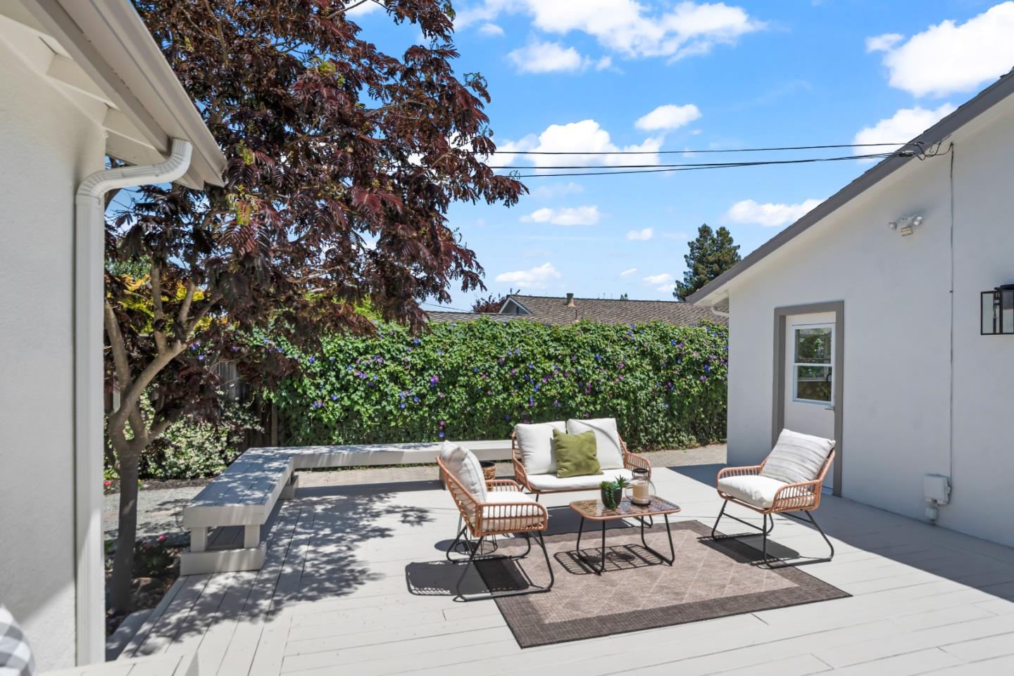 967 Chelan Drive Sunnyvale, CA 94087 - Photo 30 of 38 a view of backyard with seating space and trees in the background