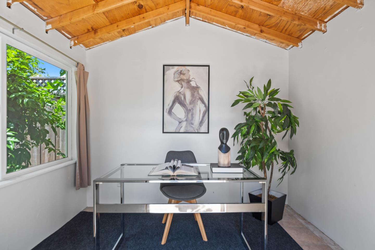 967 Chelan Drive Sunnyvale, CA 94087 - Photo 35 of 38 a table and chairs in a patio
