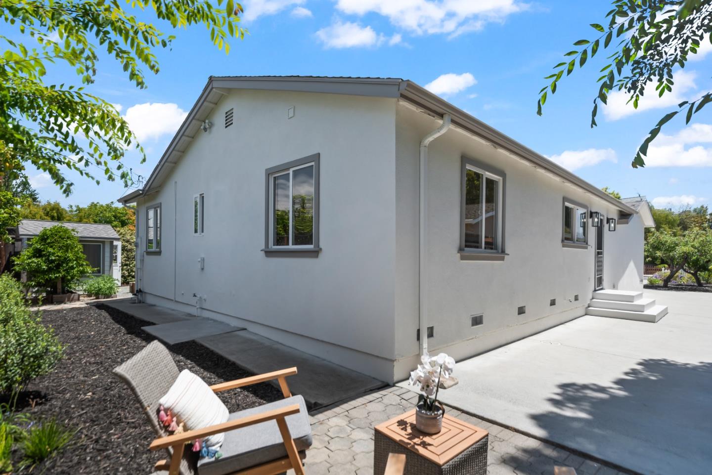 967 Chelan Drive Sunnyvale, CA 94087 - Photo 36 of 38 a backyard of a house with table and chairs