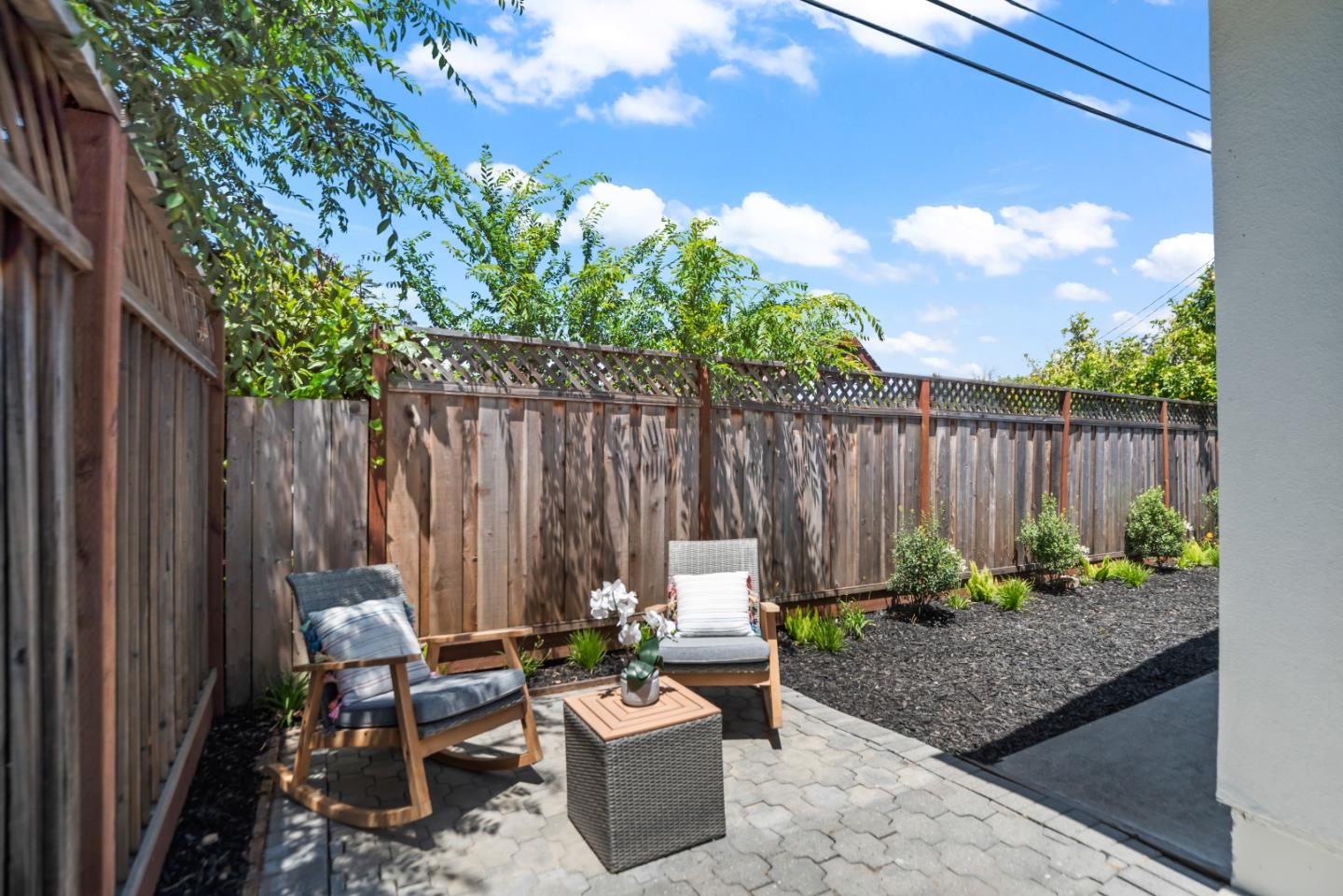 967 Chelan Drive Sunnyvale, CA 94087 - Photo 37 of 38 a backyard of a house with yard and outdoor seating
