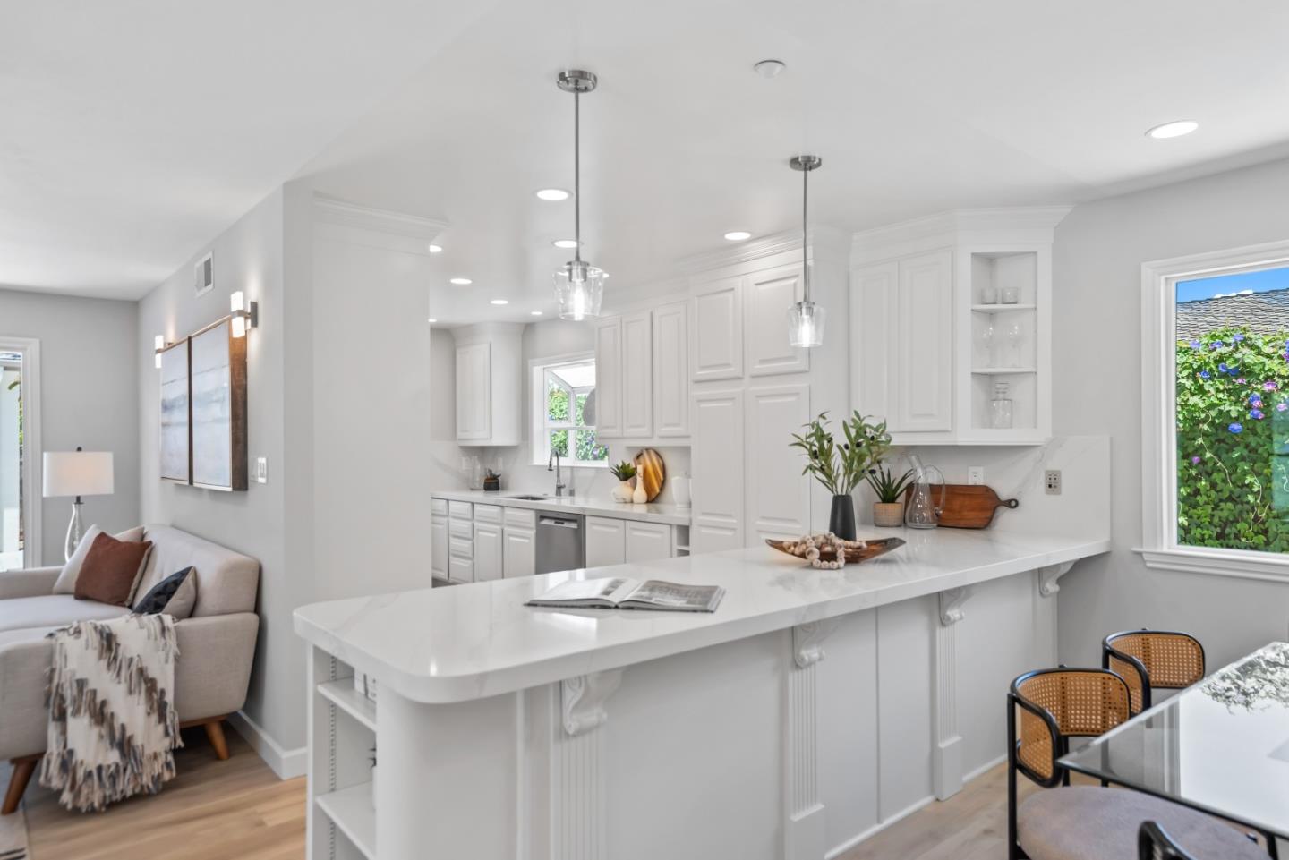 967 Chelan Drive Sunnyvale, CA 94087 - Photo 9 of 38 a kitchen with stainless steel appliances kitchen island granite countertop a sink and a refrigerator