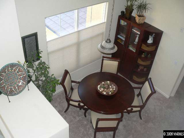 9050 Double R Boulevard, Unit 1222 Reno, NV 89521 - Photo 4 of 5 a view of a workspace with furniture