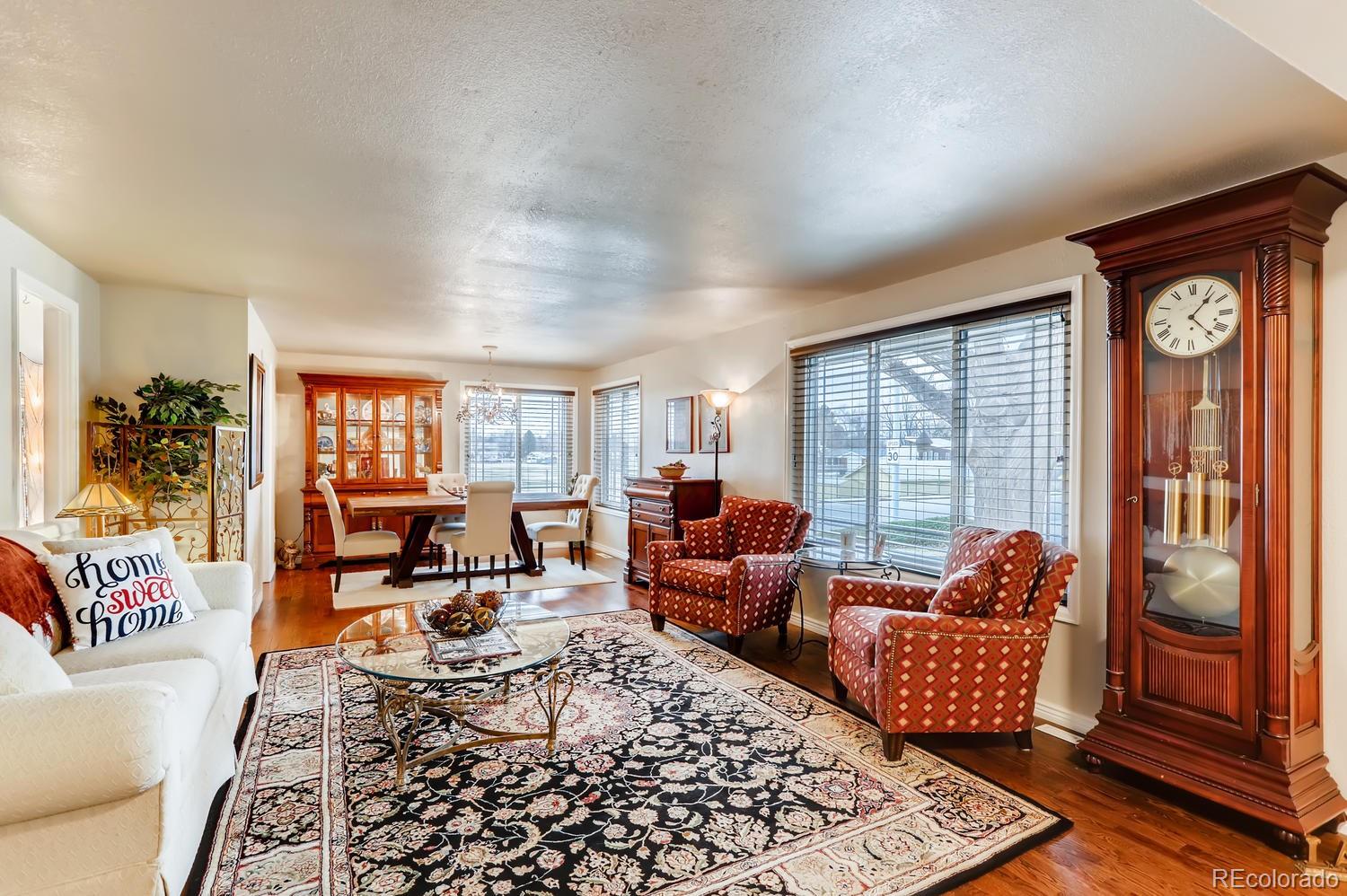 1502 Juniper Street Longmont, CO 80501 - Photo 5 of 28 a living room with furniture and a window