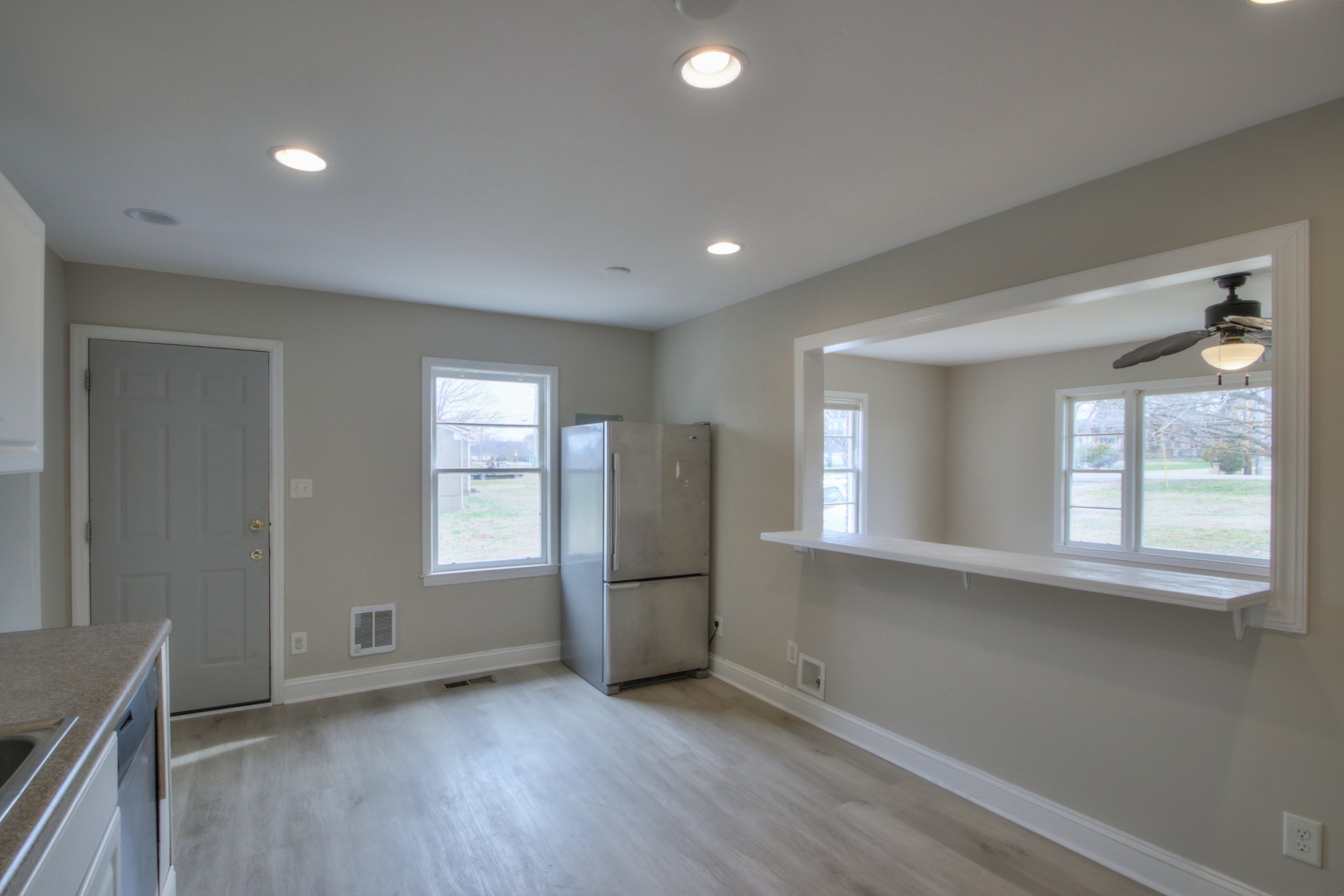 3885 Kedron Road Spring Hill, TN 37174 - Photo 12 of 32 an empty room with wooden floor and a window