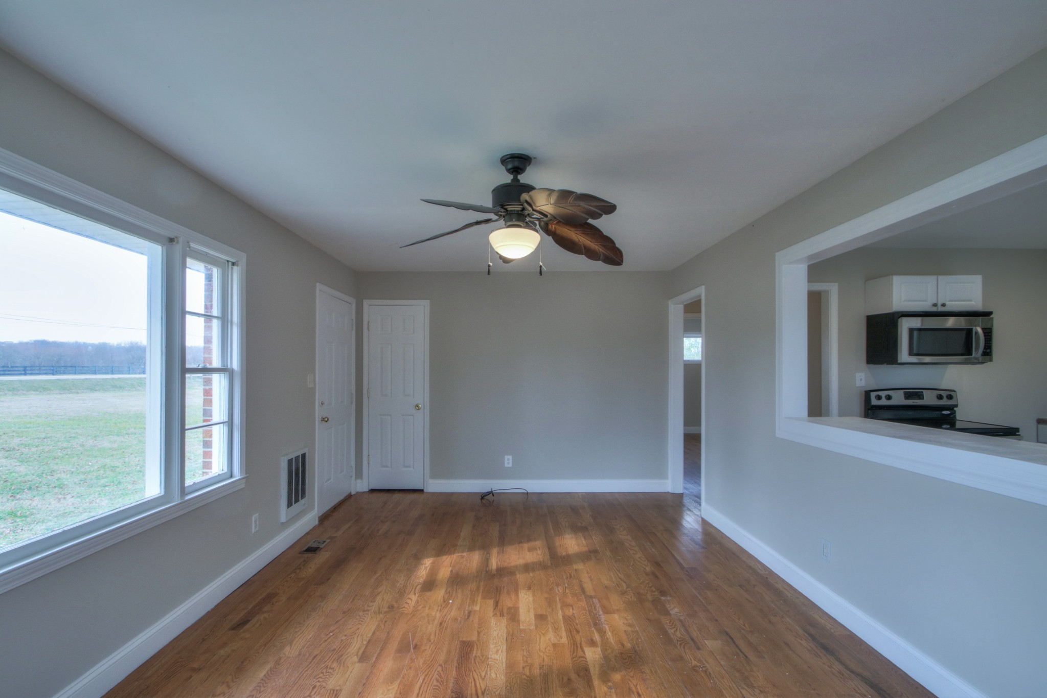 3885 Kedron Road Spring Hill, TN 37174 - Photo 19 of 32 a view of empty room with wooden floor and fan