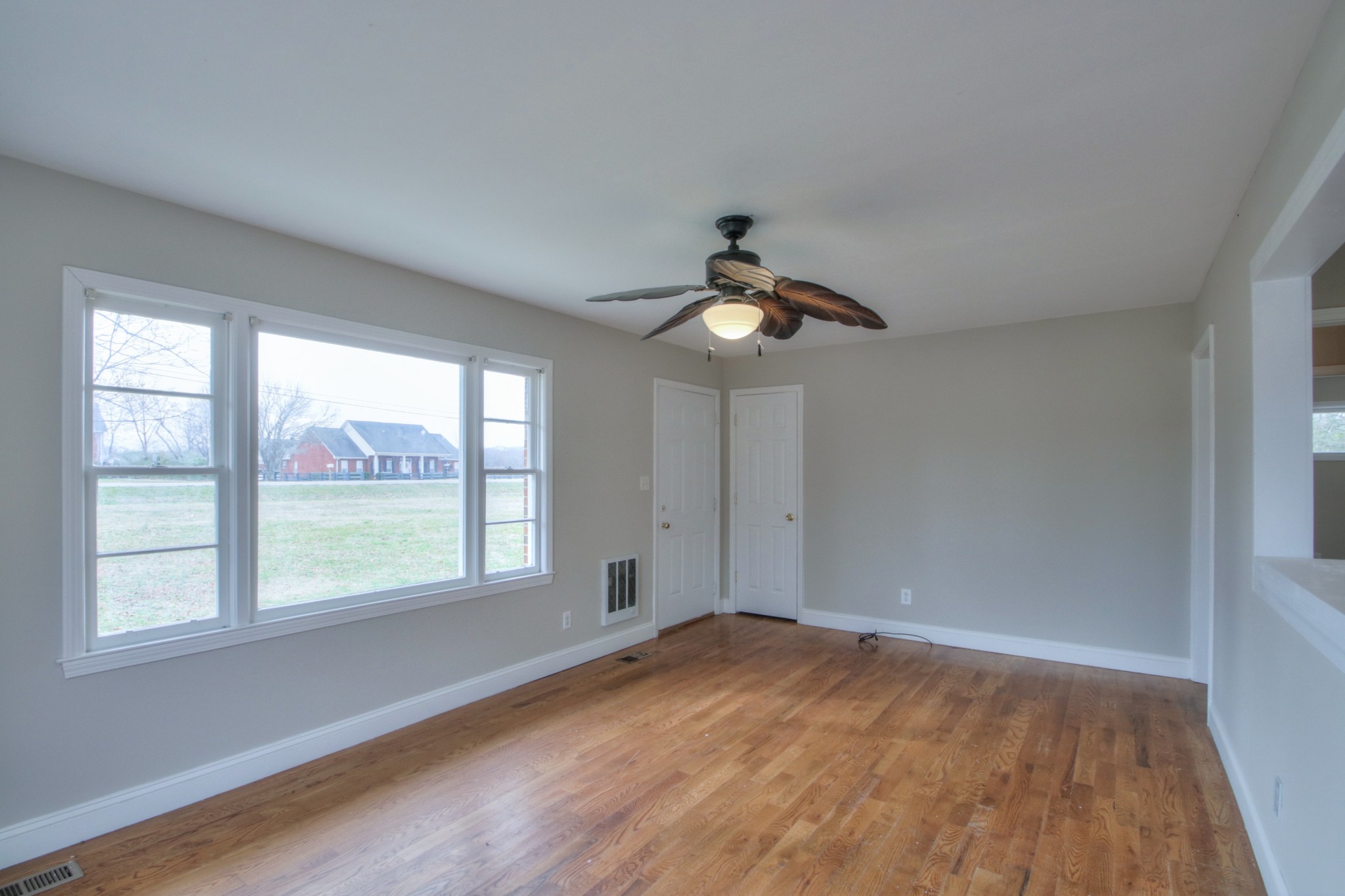3885 Kedron Road Spring Hill, TN 37174 - Photo 20 of 32 a view of empty room with wooden floor and fan
