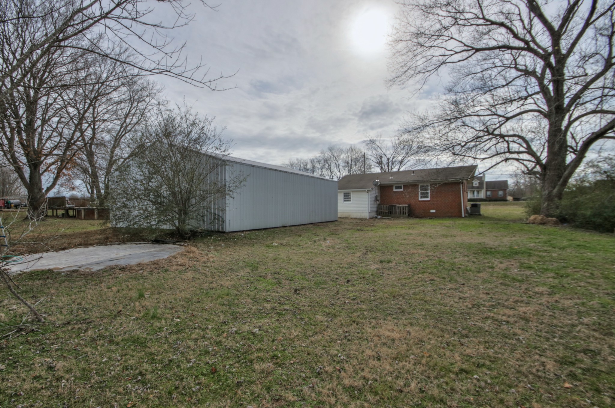 3885 Kedron Road Spring Hill, TN 37174 - Photo 21 of 32 a front view of house with yard and trees around
