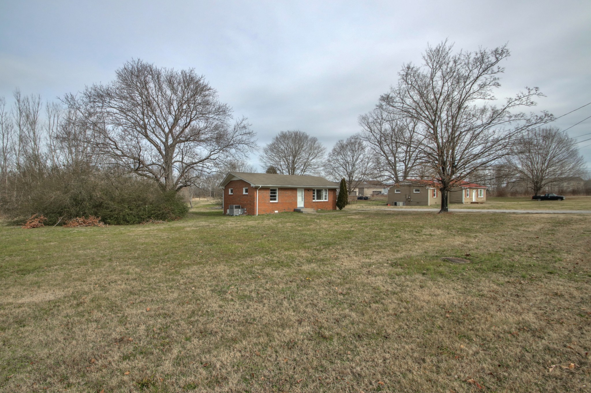 3885 Kedron Road Spring Hill, TN 37174 - Photo 27 of 32 a view of a house with a yard