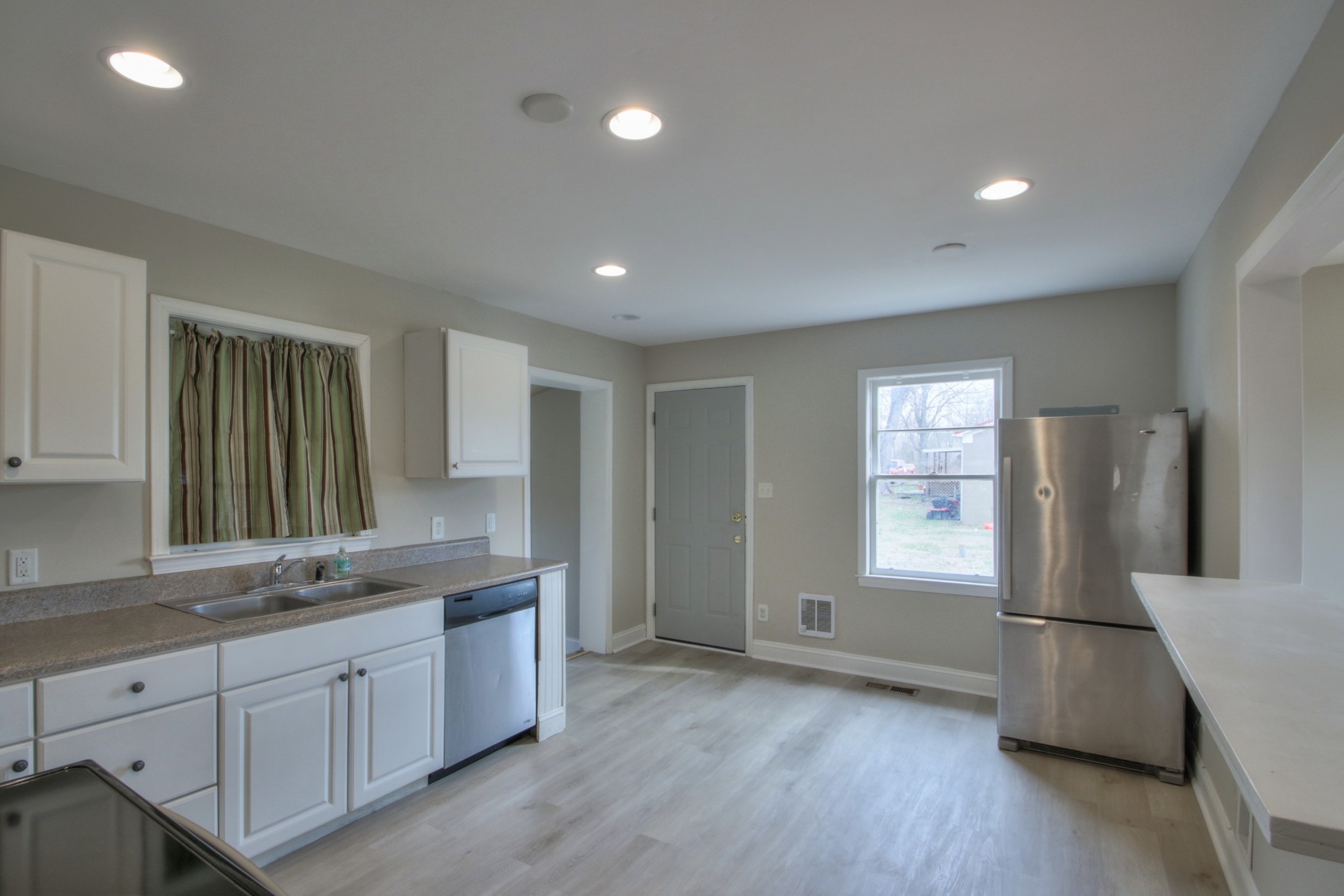 3885 Kedron Road Spring Hill, TN 37174 - Photo 10 of 32 a view of a kitchen counter space and windows