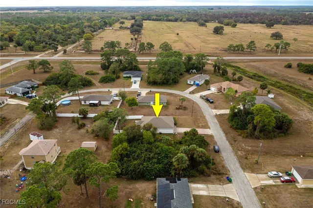 an aerial view of a city with lake view