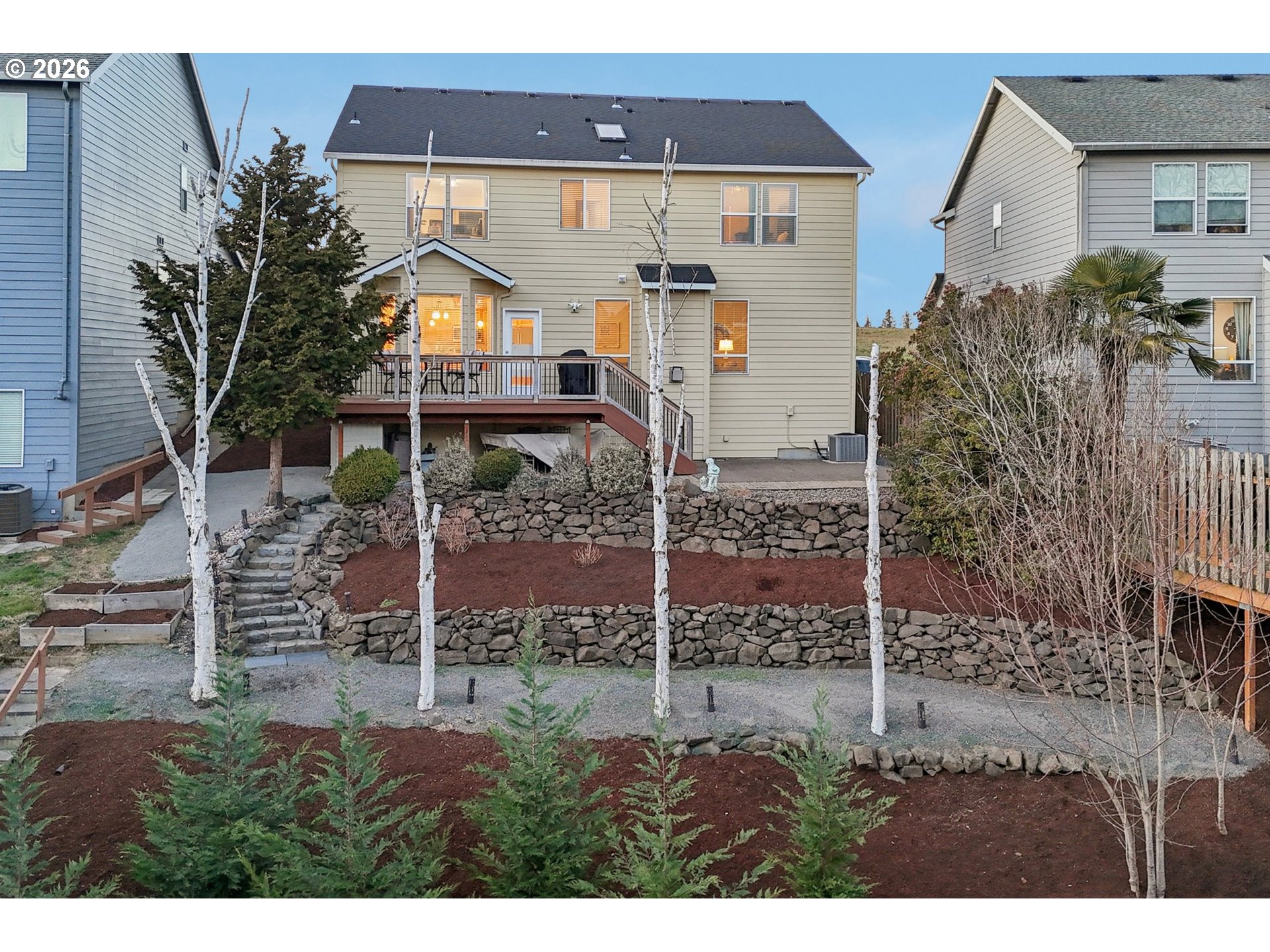 2404 Southeast Jasmine Way Gresham, OR 97080 - Photo 37 of 48 a view of a house with a garden
